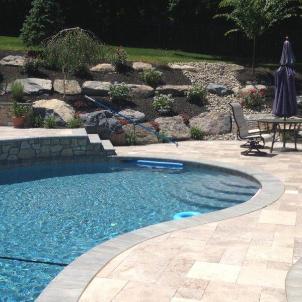 stamped concrete around inground pool